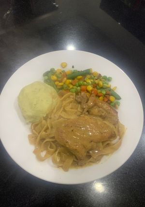 A picture of My best ever fettuccine pasta with chicken steak.