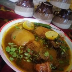 A picture of Aloo Gosht.