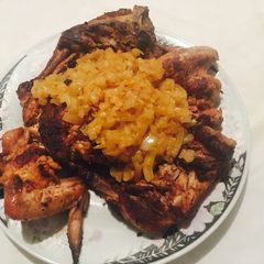 A picture of Pan grilled chicken with onion sauce.