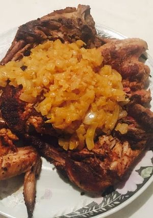 A picture of Pan grilled chicken with onion sauce.
