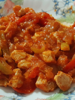 Una foto de Lomo de cerdo con tomate