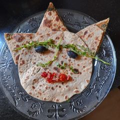 A picture of Chana saag Sattu Paratha.