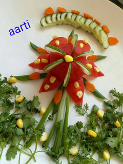 A picture of Tomato lotus flower salad.