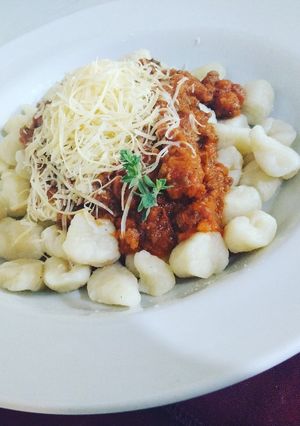 Una foto de Ñoquis caseros con bolognesa