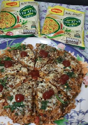 A picture of Maggi Nutrilicious Masala VEG ATTA noodles Vegetables pizza.