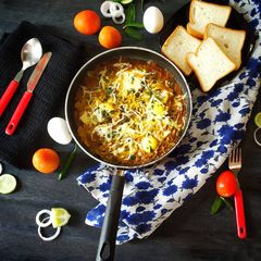A picture of SHAKSHUKA - a Middle Eastern dish.