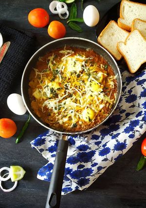 A picture of SHAKSHUKA - a Middle Eastern dish.