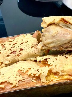 Une photo de Hanches de poulet au four en galettes durum
