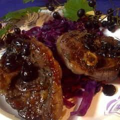 A picture of Red sweet and sour cabbage with lamb and grapes.