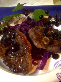 A picture of Red sweet and sour cabbage with lamb and grapes.