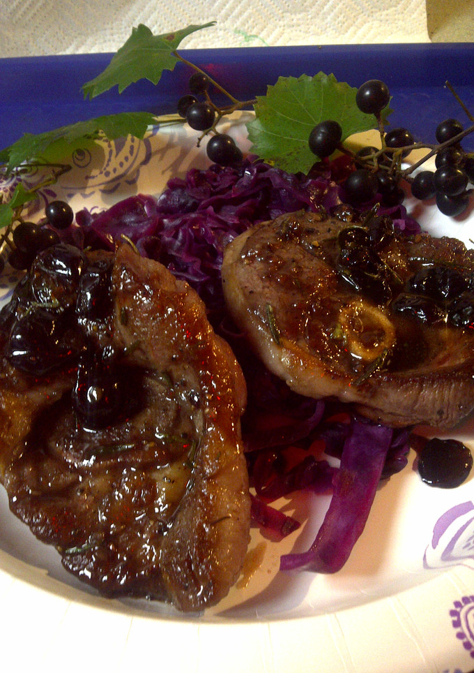 A picture of Red sweet and sour cabbage with lamb and grapes.