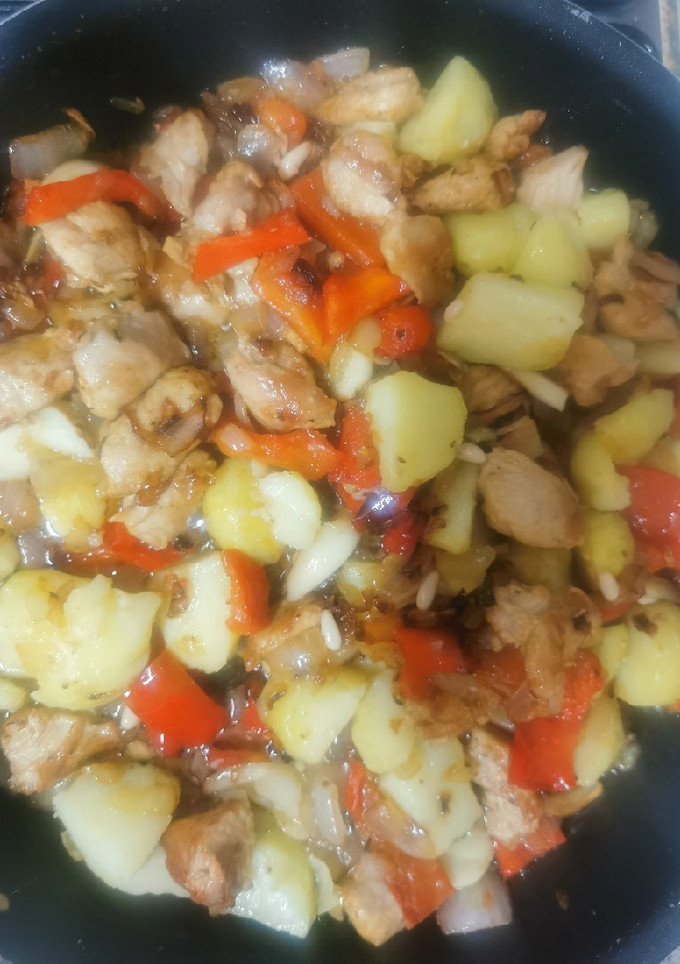 Una foto de Rustidera de pollo con patatas