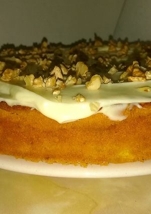 Una foto de Pastel de Zanahoria y Naranja con crema frosting