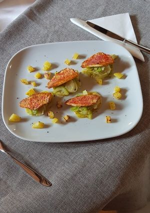 A picture of Red Mullet with Potatoes, Belgian Endive, and Celery.