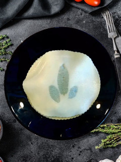 Foto di Raviolo Aperto con Gamberi Funghi e Zucchine