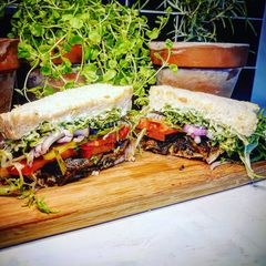 A picture of Vegan mushroom steak sandwich.