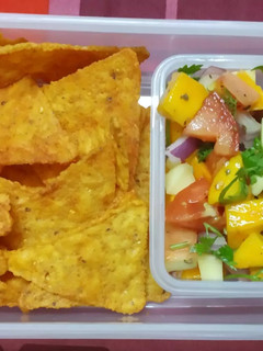 A picture of Mango salsa with nachos.