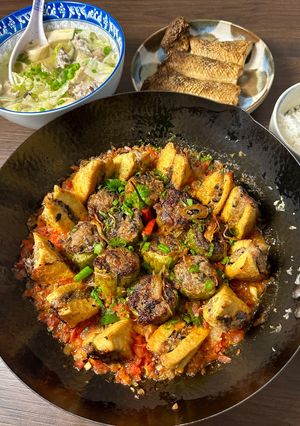 A picture of Braised Stuffed Bitter Melon & Tofu w/ Tomato Fish Sauce | Khổ Qua & Đậu Hủ Dồn Thịt Kho Sốt Cà.