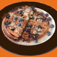 A picture of Chocolate Waffle with Blueberries.