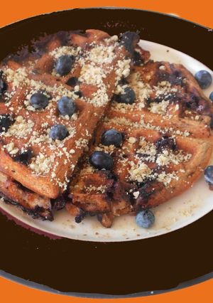 A picture of Chocolate Waffle with Blueberries.
