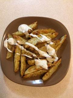 A picture of Potato wedges.