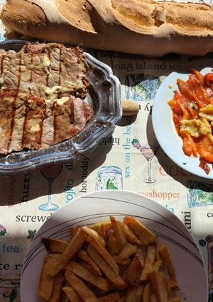 Foto principal de Cachopo a la parrilla con pimientos y ajo a la parrilla asados