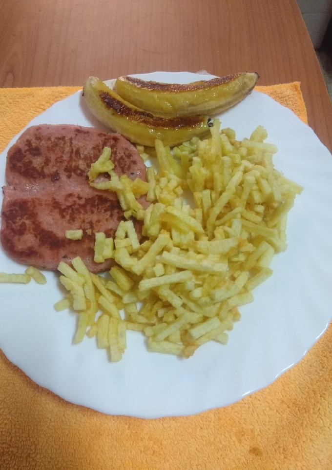 Una foto de Hamburguesa de pollo estilo canario