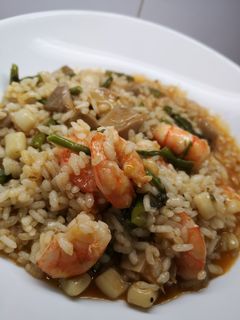 Una foto de Arroz meloso de trigueros y setas