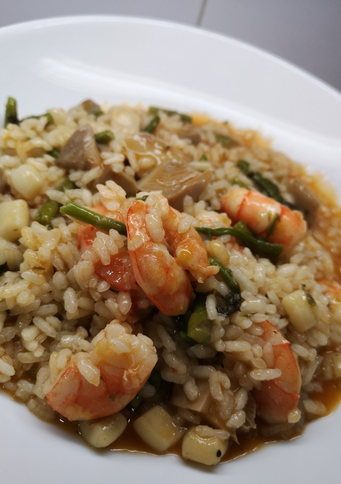 Una foto de Arroz meloso de trigueros y setas