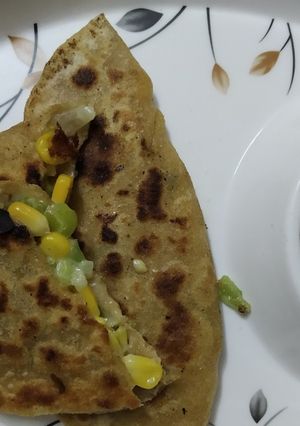 A picture of Corn cheese stuff pratha.