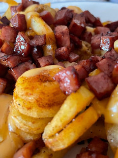 Foto de Batata frita com cheddar e bacon