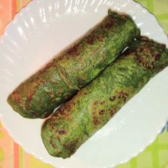 Liquid dough Spinach paratha A picture of Liquid dough Spinach paratha.