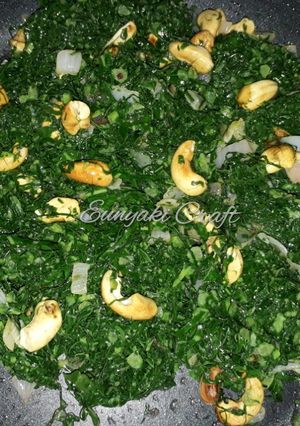 A picture of Sauteed Sukuma Wiki with Toasted Cashew Nuts.