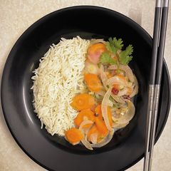 A picture of Spiced Vegetables with Coconut on Rice.