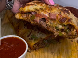 HEAVY meat lovers Stromboli