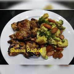 Chicken steak & stir fry vegetables A picture of Chicken steak & stir fry vegetables.