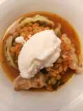 Yellow lentil stew with gyozas