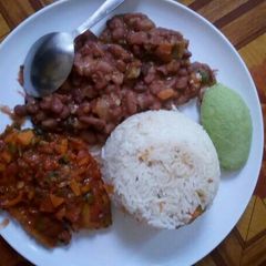 Simple,rice,fish fillet,beans and avocado A picture of Simple,rice,fish fillet,beans and avocado.
