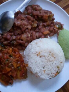A picture of Simple,rice,fish fillet,beans and avocado.