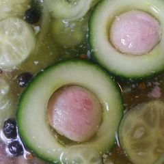 A picture of Pickled Cucumber stuffed with Spam.