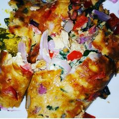 A picture of Fried egg with vegetable.
