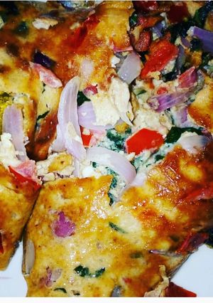A picture of Fried egg with vegetable.