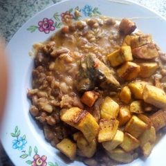 A picture of Beans porridge, fried plantain and fish.