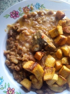 A picture of Beans porridge, fried plantain and fish.