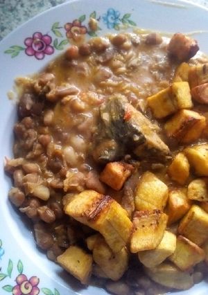 A picture of Beans porridge, fried plantain and fish.