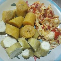 A picture of Plantain and sweet potatoes with egg sauce.