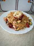 Espaguetis con pavo y tomates secos