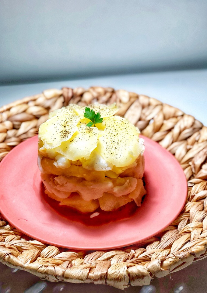Una foto de Timbal de patata y bacalao