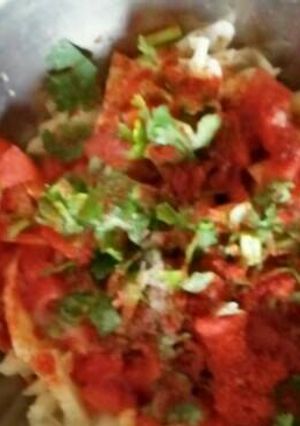 A picture of Cabbage and tomato salad.
