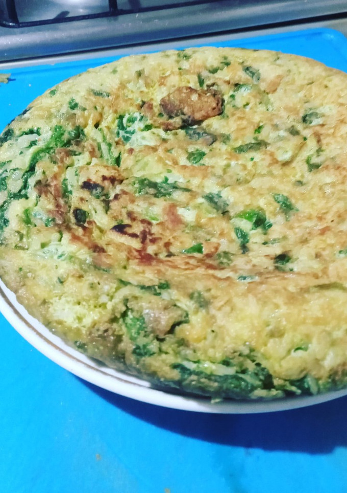 Una foto de Tortilla de arroz con espinacas